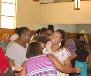 Yound-adults-greeting-after-service-at-WCOG